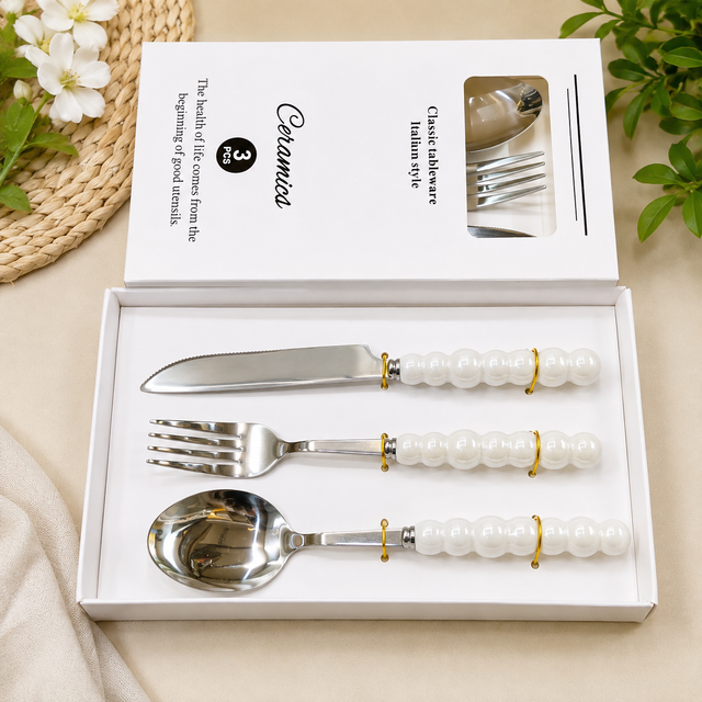 3-piece gold cutlery set with beaded handles including spoon, fork and knife in gift box