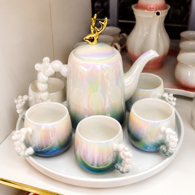 Luxury Ceramic Tea Set with Rotating Serving Tray – 8 Pieces