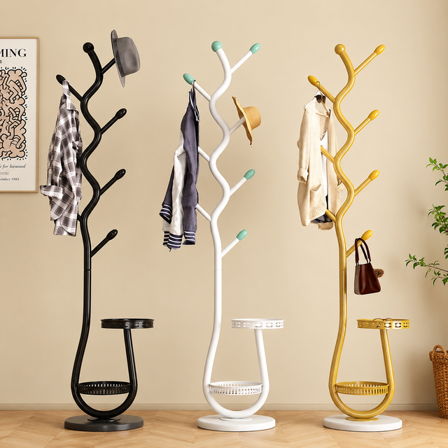 Modern tree-style standing coat racks in black, white, and gold finishes with multiple hooks and storage trays for coats, hats, handbags, and home organization.