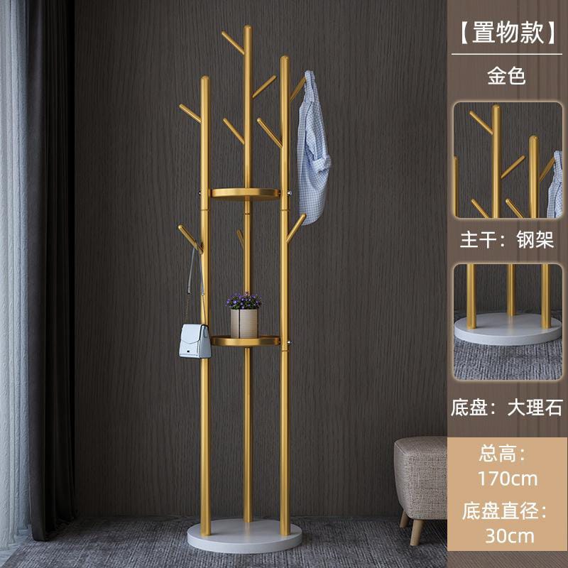 Modern gold metal coat rack stand with storage shelves for hats, clothes, umbrellas, and flower pots in a stylish home interior.