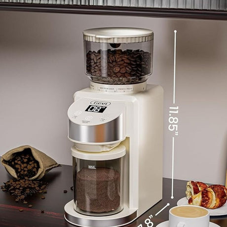 Electric Coffee Grinder – Precision Bean Grinding Machine
Elevate your coffee experience with this premium electric coffee grinder designed for home or café use. With a sleek, modern design and intuitive touch controls, it delivers consistent, fresh grinds every time.
Features:
⚙️ Grind Settings: Adjustable for drip, pour-over, French press & espresso
📏 Dimensions: Height – 11.85 inches | Width – 7.8 inches
☕ Capacity: Large bean hopper & ground coffee container for multiple servings
🖥️ Digital Displa