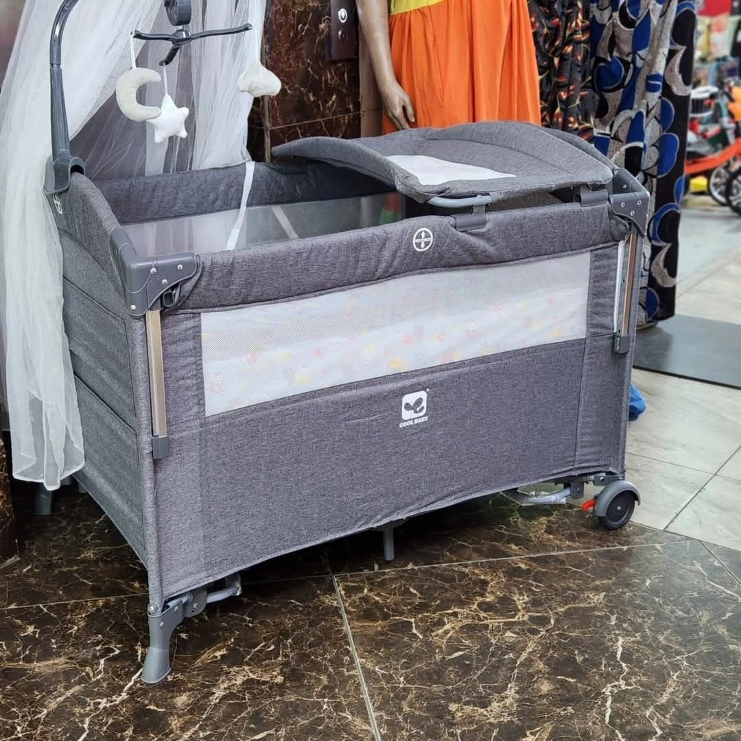 Baby Co-Sleeper Playpen
A versatile and cozy sleeping and play space designed for comfort, safety, and convenience—ideal for newborns to toddlers.
Key Features:
• Multi-functional use – Acts as a co-sleeper, crib, and playpen
• Side opening panel – For easy access during co-sleeping
• Mesh sides – Enhance airflow and allow clear visibility
• Padded mattress base – Ensures baby’s comfort
• Lockable wheels – For easy mobility and stability
• Foldable design – Portable and easy to store
• Storage compartment