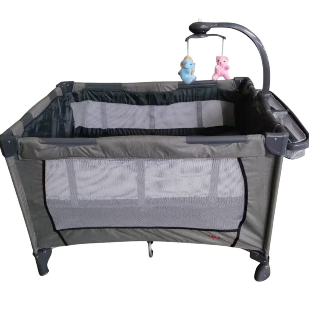 Baby Cots / Playpens
A safe and comfortable space for your baby to sleep or play, designed with convenience and care in mind.
Key Features:
• Multi-purpose use – Can be used as a baby cot or playpen
• Hanging toys – Stimulates baby’s senses and keeps them engaged
• Fitted mosquito net – Offers protection from insects while sleeping
• Breathable mesh sides – Ensure good airflow and visibility
• Sturdy frame – Provides reliable support and safety
• Compact & portable – Easy to fold and move around