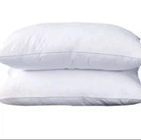 A pair of compressed comfy pillows