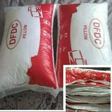 A pair of compressed comfy pillows