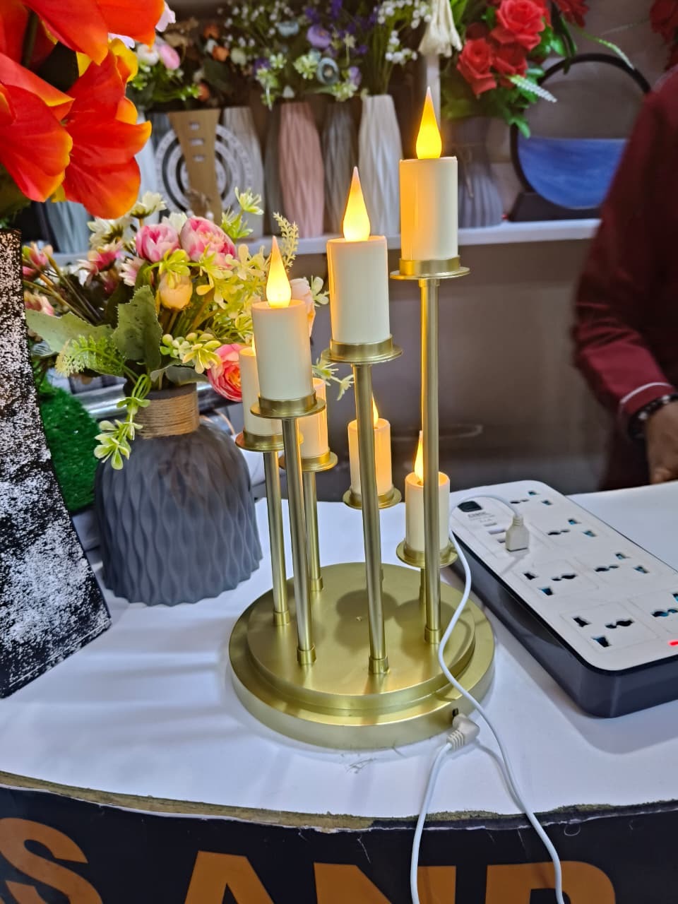 a set of six led candles for events decoration with stands