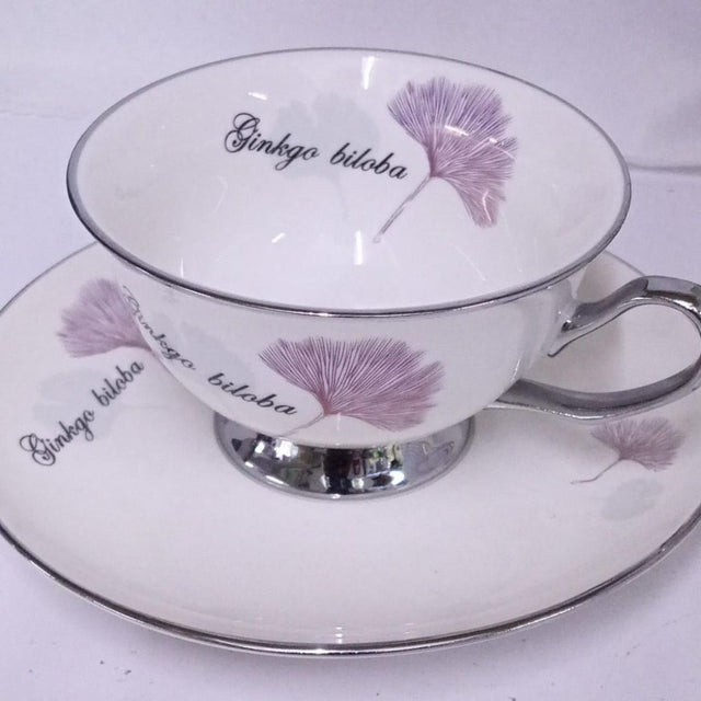 Cup and Saucer Pink Biloba With Stand