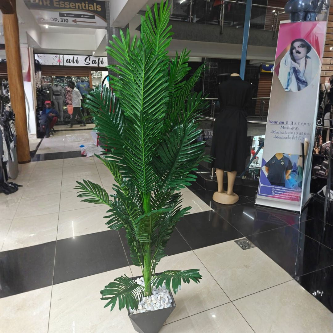 Artificial palm indoor plant with decorative plastic vase