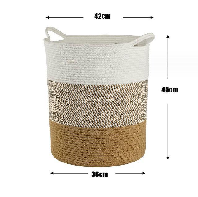 A hand wooven multi-purpose basket in beige and white, with dimensions 40cm in diameter and 35cm in height.