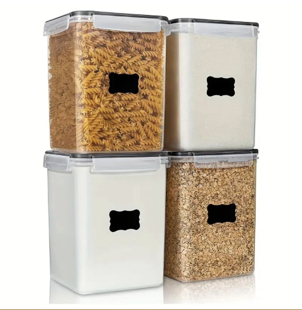 Four clear BPA free airtight food storage containers of different sizes with stickers on the front, along with a pen and measuring cups.