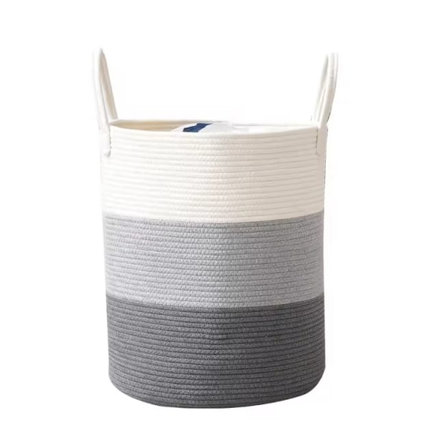 A cylindrical cotton rope laundry basket with a white and gray color scheme.