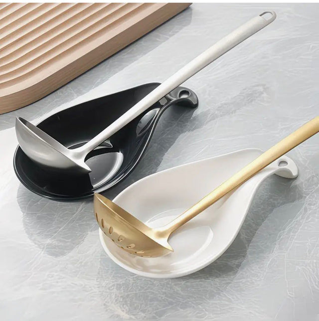 Kitchen spoon rest and ladle holder with drip tray for spoons, ladles, spatulas and cooking utensils.