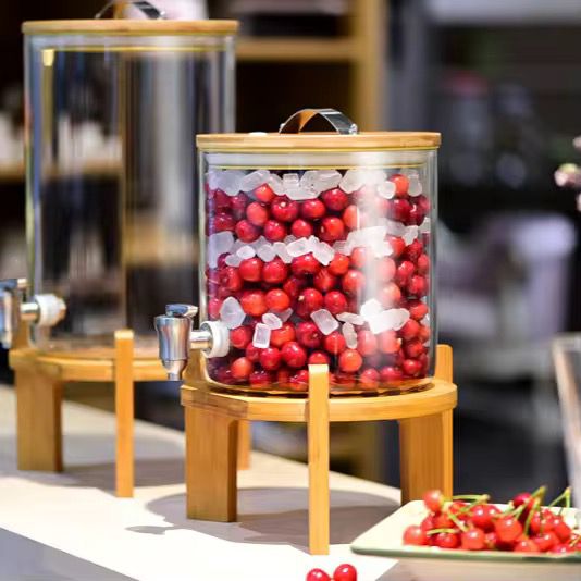 Borosilicate glass drink dispenser with faucet and bamboo stand