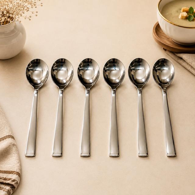 Signature stainless steel heavy soup spoons sold as a 12-piece dozen with a polished mirror finish.