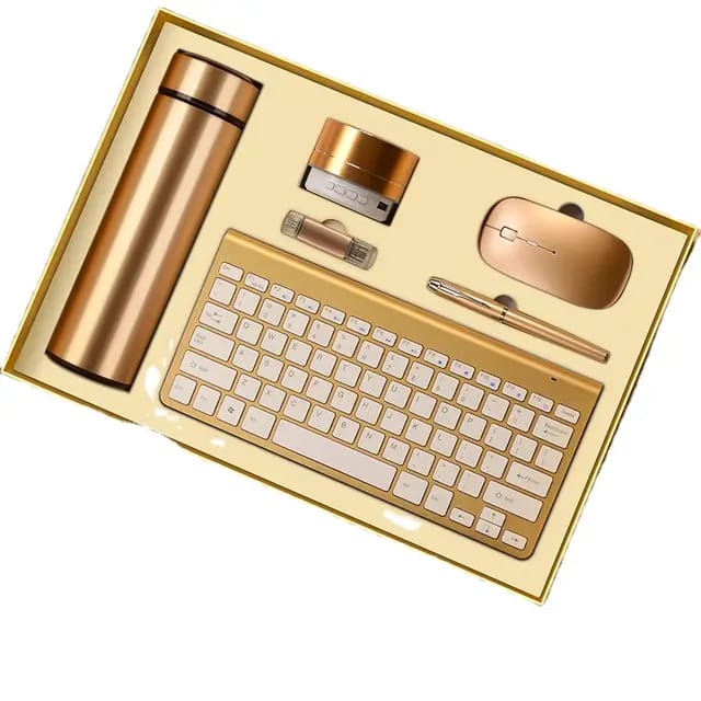 A gift set including a wireless keyboard, wireless Bluetooth speaker with flash drive, wireless mouse, powerbank, flash drive, LED digital thermal flask, and an executive signature pen, all in gold color, neatly arranged in a presentation box.