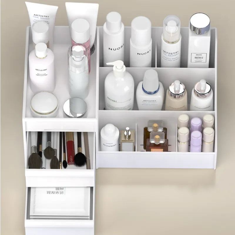 A makeup organizer with several drawers in white, containing various makeup items like bottles, brushes, and lipsticks.