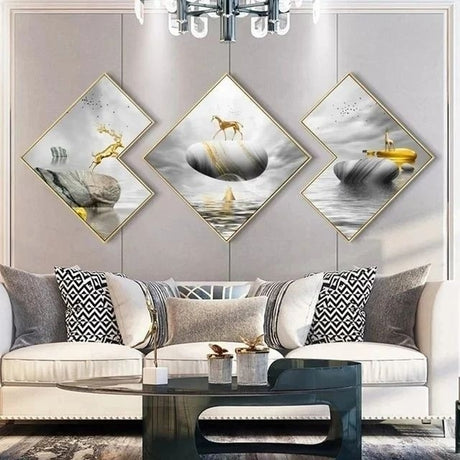 A set of four modern decorative paintings featuring special shaped canvases with a fantasy theme, displayed above a sofa in a well-lit living room setting.