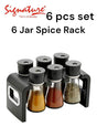 6-piece spice rack set with glass jars and black lids on a white background, featuring the Signature brand.