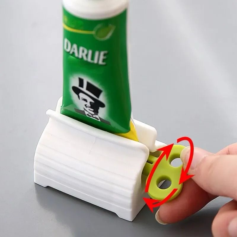 Roll up toothpaste squeezer