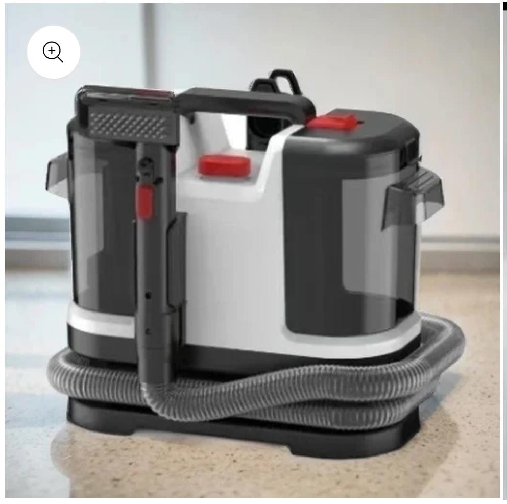A compact, upright Multifunctional Sofa Cleaning Machine with a white body, black accents, and a clear dustbin.