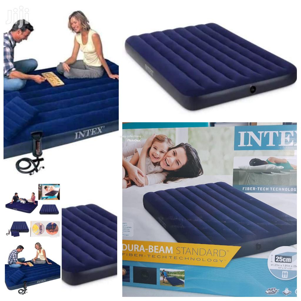 inflatable mattress with a pump