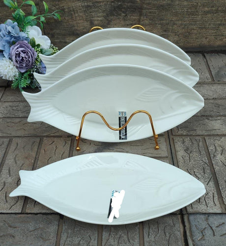 Ceramic Fish Plates
🍽️ Material: High-quality glazed ceramic

🐟 Design: Fish-shaped with fine detailing for a stylish table setting

💧 Use: Perfect for serving seafood, appetizers, or snacks

🧼 Features: Durable, easy to clean, and microwave-safe

A unique blend of function and coastal charm for your dining table.