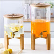 Juice/beverage dispenser with stand