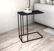 Black metallic C-shaped sofa side table with rectangular top and space-saving design
