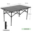 A foldable picnic camping table in gray with dimensions labeled, including a carry bag.