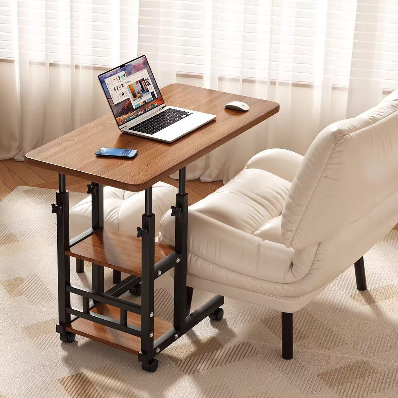 Adjustable mobile laptop desk with storage shelf, wheels, and height adjustment from 63–90cm. Perfect for bed, sofa, study, and home office use.