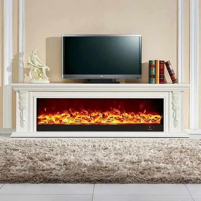 Luxury white carved wood electric fireplace TV stand with full-width orange LED flame display, ornate floral column details, flat top surface holding a television and decorative books  living room statement mantel cabinet available at iDecorators Kenya, Nairobi.