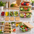 Glass food storage containers bamboo lids stacked on marble kitchen counter — iDecorators Kenya