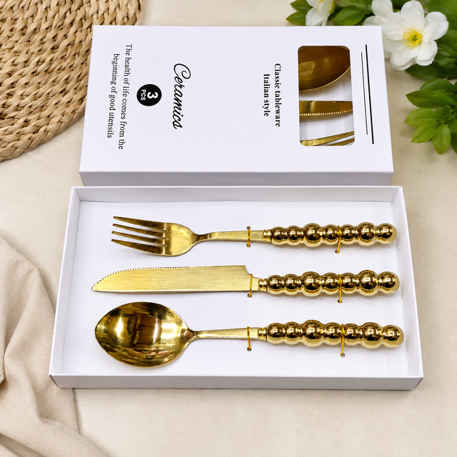 3-piece gold cutlery set with beaded handles including spoon, fork and knife in gift box