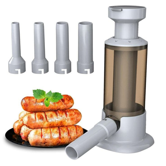 Manual sausage stuffer machine with transparent filling cylinder, stable white base, side nozzle spout, and 4 interchangeable grey filling tubes in different sizes, shown with grilled sausages — home meat filler kit available at iDecorators Kenya, Nairobi.