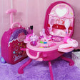 Pink kids 3-in-1 makeup suitcase playset with toy beauty accessories, mirrors, brushes, and pretend salon dressing table for girls role play.