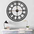 Large Roman numeral skeleton wall clock black 60cm — iDecorators Kenya