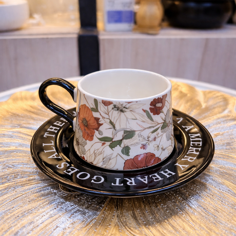 Premium porcelain coffee cup with a stylish floral pattern and matching saucer. Designed for elegance, durability, and a refined serving experience.