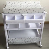 Baby Bath and Changing Station

A convenient all-in-one solution for baby care, combining a padded changing table with multiple storage compartments and a built-in baby bath.

Key Features:

Dual Function: Combines changing table and baby bathtub

Soft Changing Pad: Cushioned top with star-print cover for baby comfort

Ample Storage: Multiple compartments for diapers, wipes, clothes, and essentials

Mobility: Equipped with lockable wheels for easy movement

Hygienic & Practical: Easy to clean and perfect fo