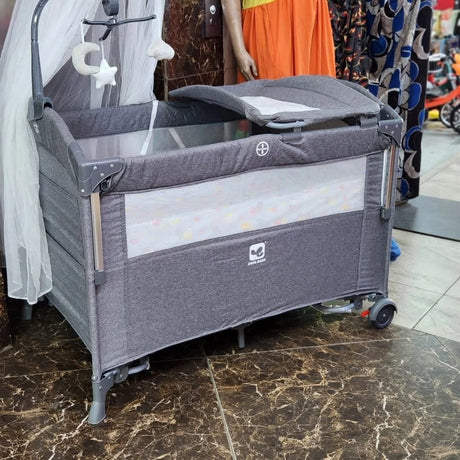 Baby Co-Sleeper Playpen

A versatile and cozy sleeping and play space designed for comfort, safety, and convenience—ideal for newborns to toddlers.

Key Features:
• Multi-functional use – Acts as a co-sleeper, crib, and playpen
• Side opening panel – For easy access during co-sleeping
• Mesh sides – Enhance airflow and allow clear visibility
• Padded mattress base – Ensures baby’s comfort
• Lockable wheels – For easy mobility and stability
• Foldable design – Portable and easy to store
• Storage compartment