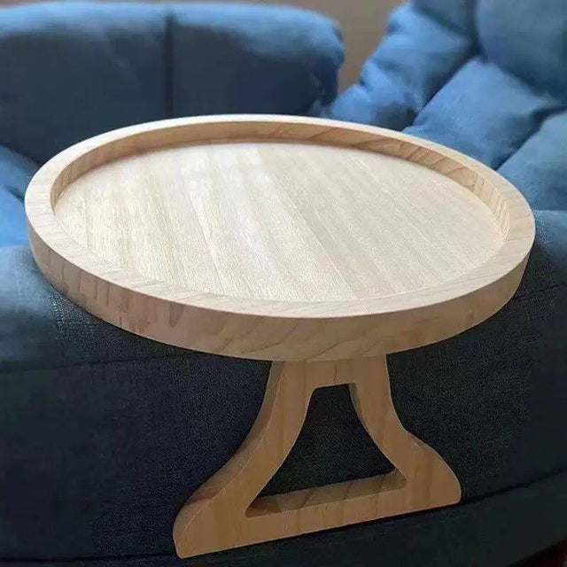 Wooden tray with a stand on a blue cushioned surface grc