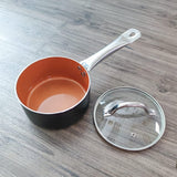 Material: Aluminum

Color: Brownish

Brand: GOTHAM STEEL

Capacity: 1.5 Liters

Non-stick coating – food slides off easily, no oil or butter needed

Scratch-proof and metal utensil safe – ultra-durable surface

Lightweight design – easy and comfortable to handle