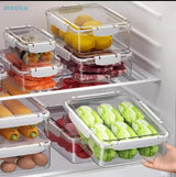 Transparent airtight acrylic food storage containers with locking lids in 700ml, 1700ml, and 3300ml sizes.