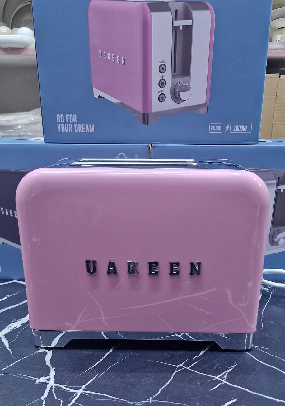 UAKEEN Germany 1000W 2-slice retro toaster in matte black with chrome trim, cancel reheat and defrost function buttons and browning level dial
