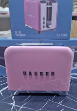 UAKEEN Germany 1000W 2-slice retro toaster in matte black with chrome trim, cancel reheat and defrost function buttons and browning level dial