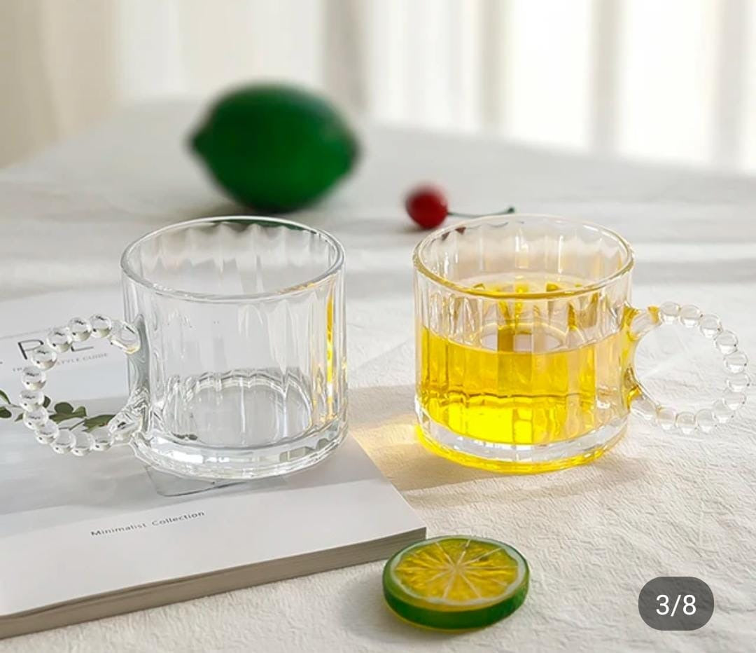 Luxury borosilicate glass cup with pearl like handle