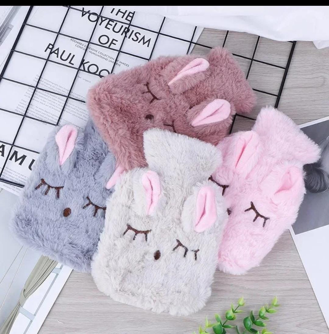 Cute rabbit shape fleece hot water bottle.