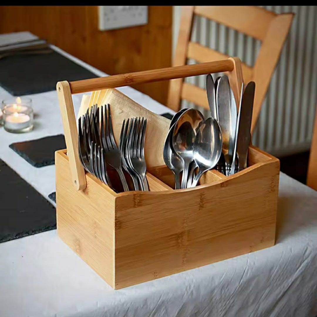 Portable countertop/kitchen cutlery organizer with handle.