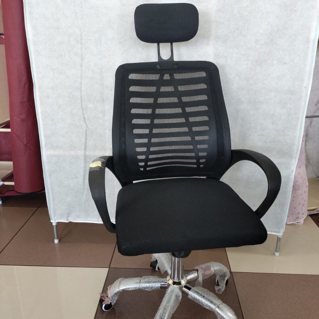 A black mesh office chair with a headrest and armrests, standing on a five-point wheeled base.