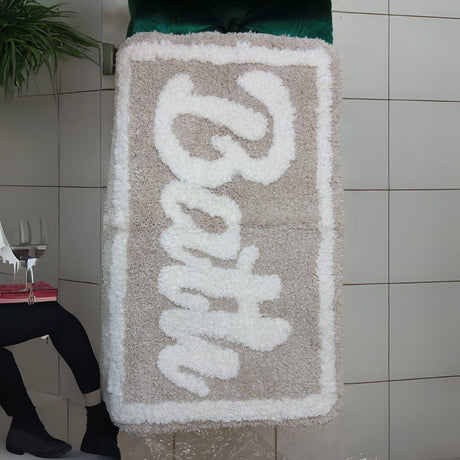 Material: Made from ultra-soft microfiber for a plush, comfortable feel underfoot.

Absorbency: Quickly absorbs water, keeping your bathroom floor dry and slip-free.

Backing: Non-slip rubber or latex backing for enhanced safety and grip.

Design: Simple, elegant design that complements most bathroom interiors.

Use: Ideal for placing near the shower, bathtub, or bathroom entrance.

Care: Machine washable and quick-drying for easy maintenance.