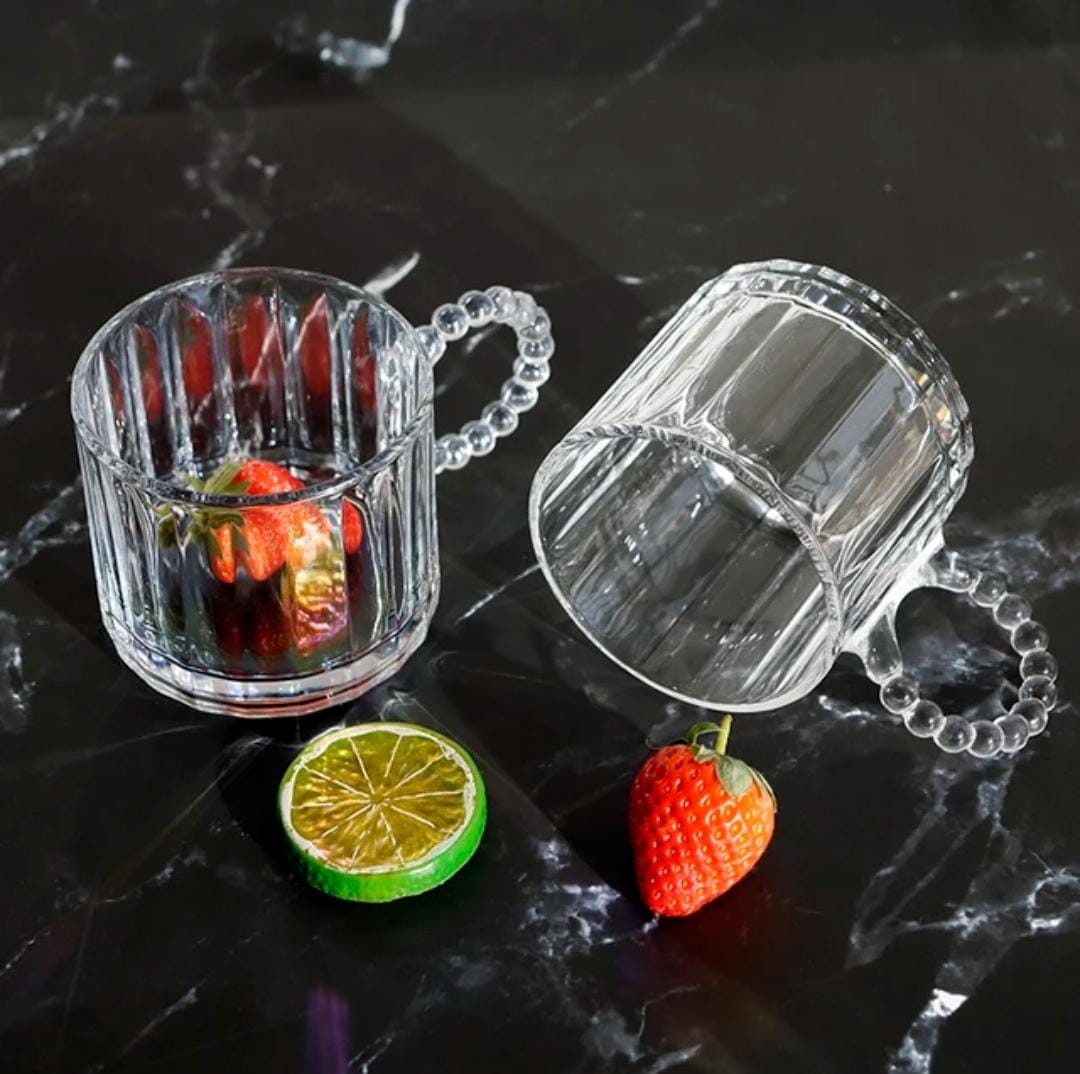 Luxury borosilicate glass cup with pearl like handle